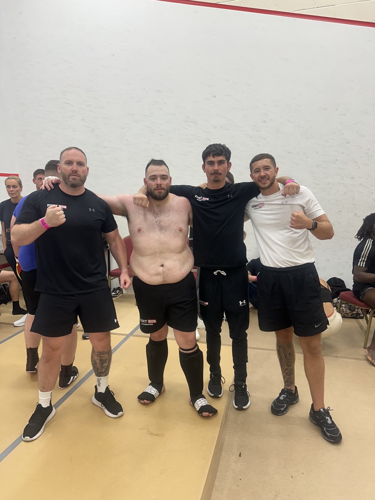 Fight Hub Basingstoke members celebrating after fight night