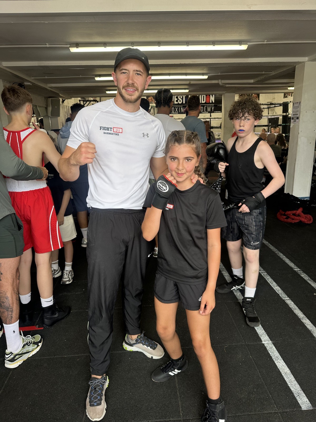 Coach with a young member at Fight Hub Basingstoke